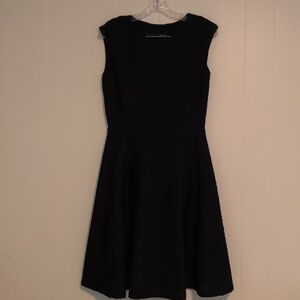 CHETTA B - Elegant Black Dress.- NWOT. Size 6. Sleeveless
